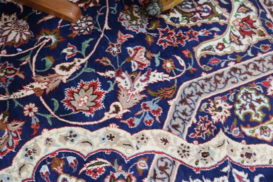 A Tabriz blue ground carpet, 410 x 272cm